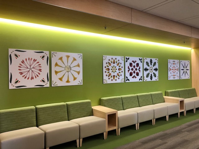 Rendering of 7 botanical pieces in hospital lobby